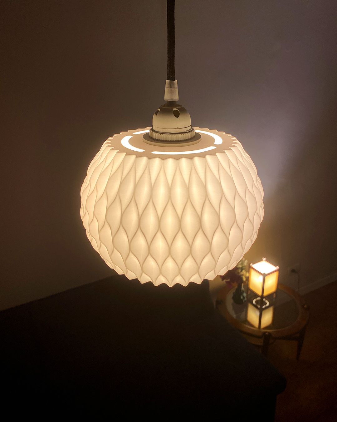 Print3D Africa WAVY pendant lamp illuminated showing sculpted wave texture