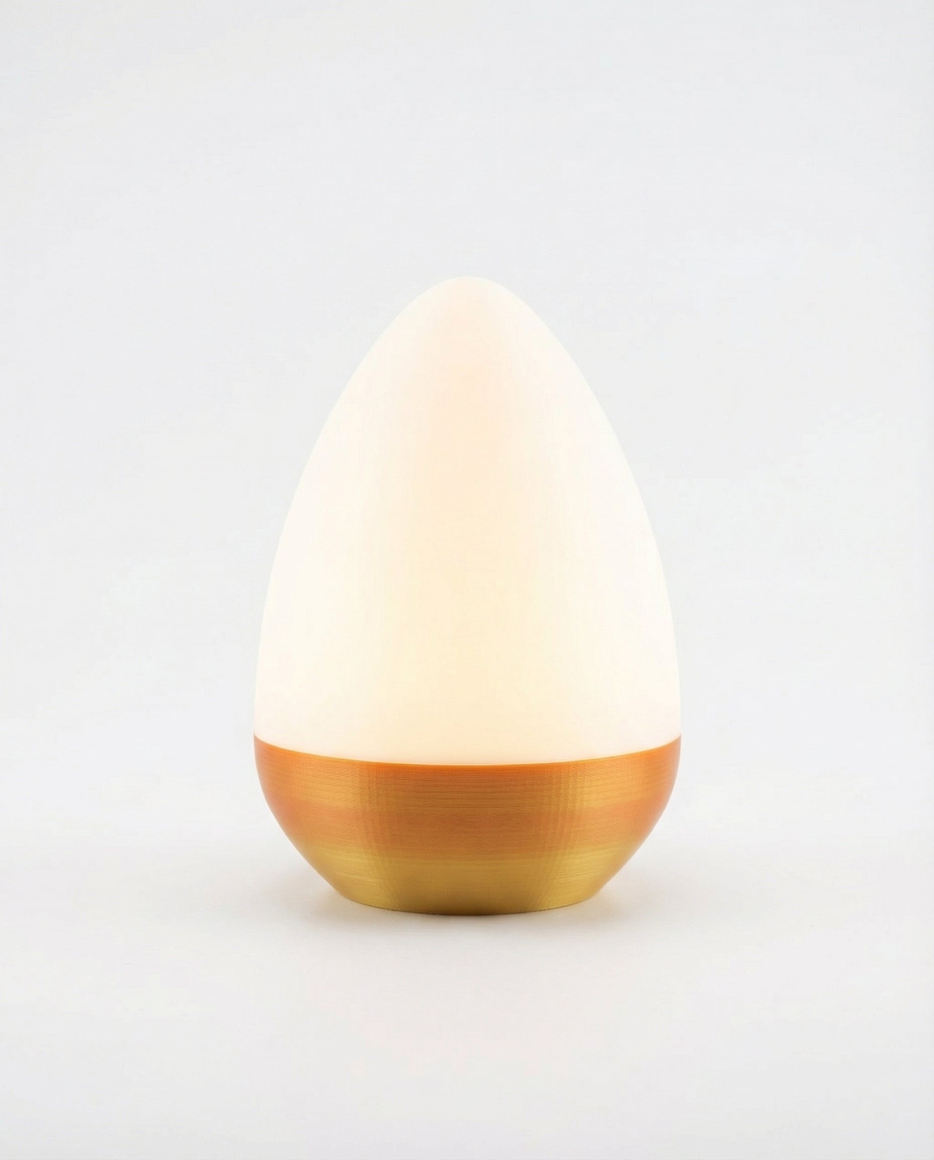 Print3D Africa Egg Lamp – white and warm gold 3D printed table lamp | Red Rhino Kenya