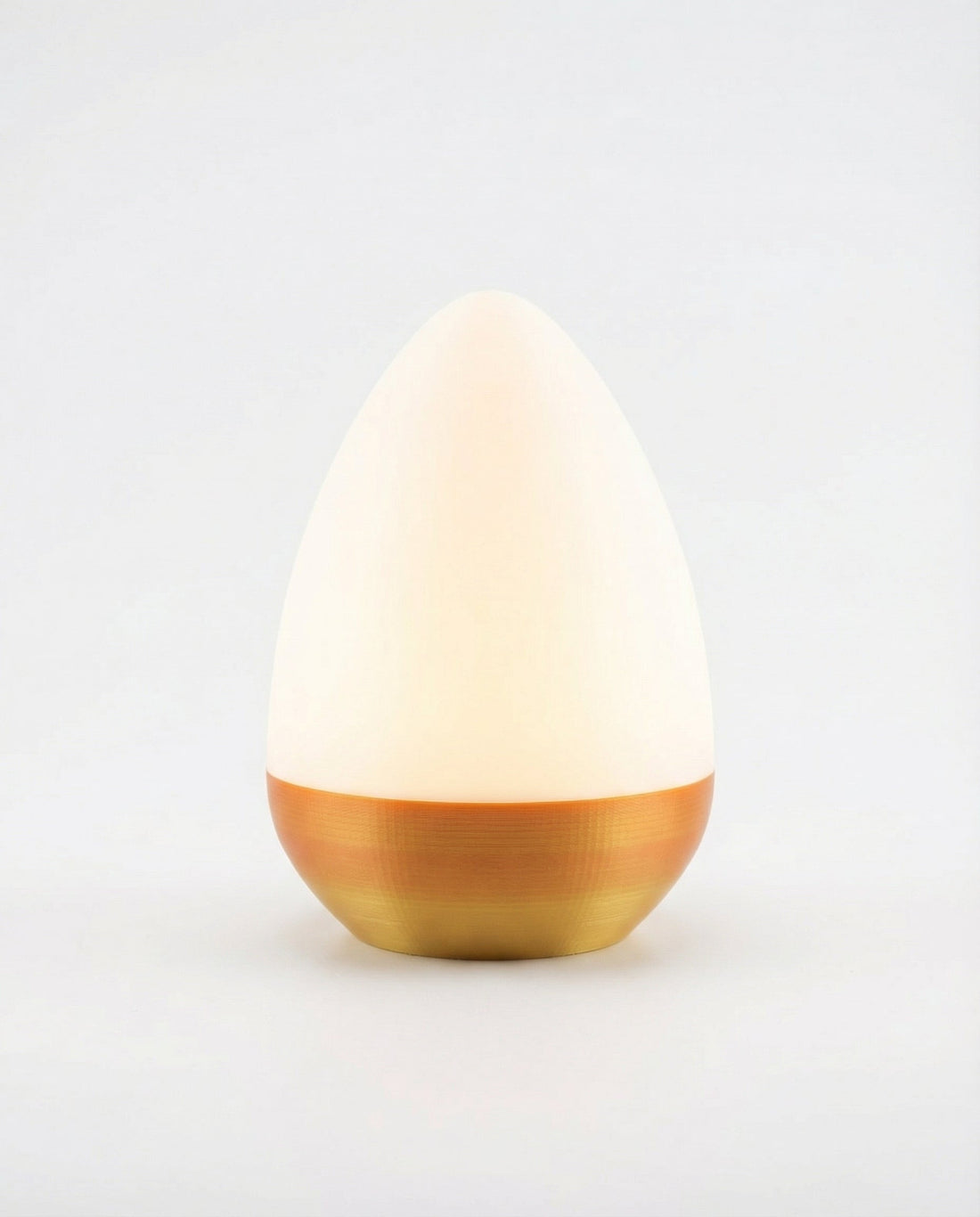 Print3D Africa Egg Lamp – white and warm gold 3D printed table lamp | Red Rhino Kenya