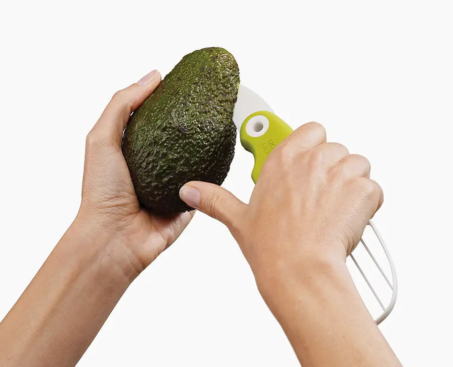 Joseph Joseph GoAvocado 3-in-1 Avocado Tool 20112 — folding blade opening an avocado