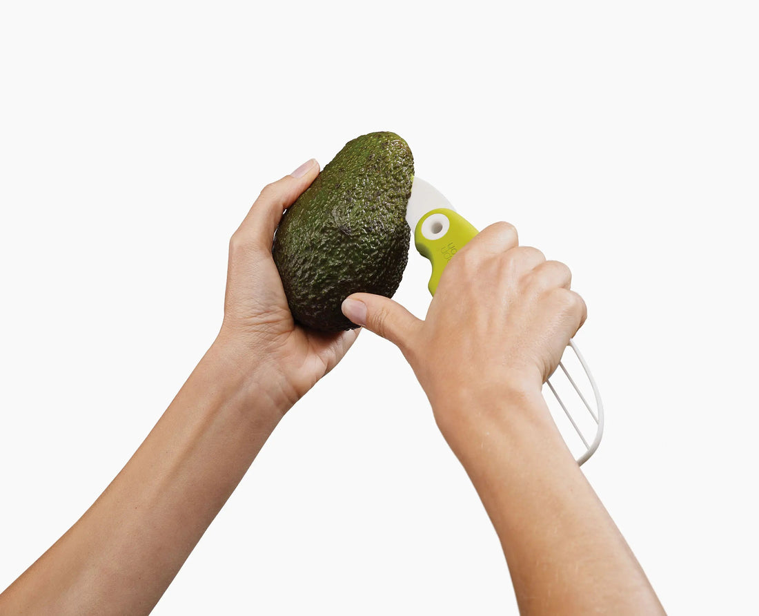 Joseph Joseph GoAvocado 3-in-1 Avocado Tool 20112 — stainless-steel pitter removing the stone