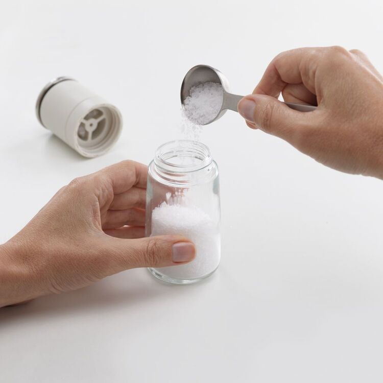 Joseph Joseph Duo No-spill salt mill opened for clean, easy refilling