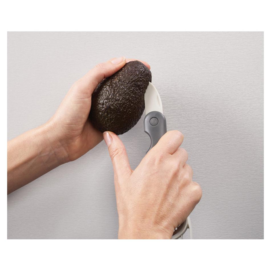 Joseph Joseph Duo Avocado Tool cutting through avocado skin