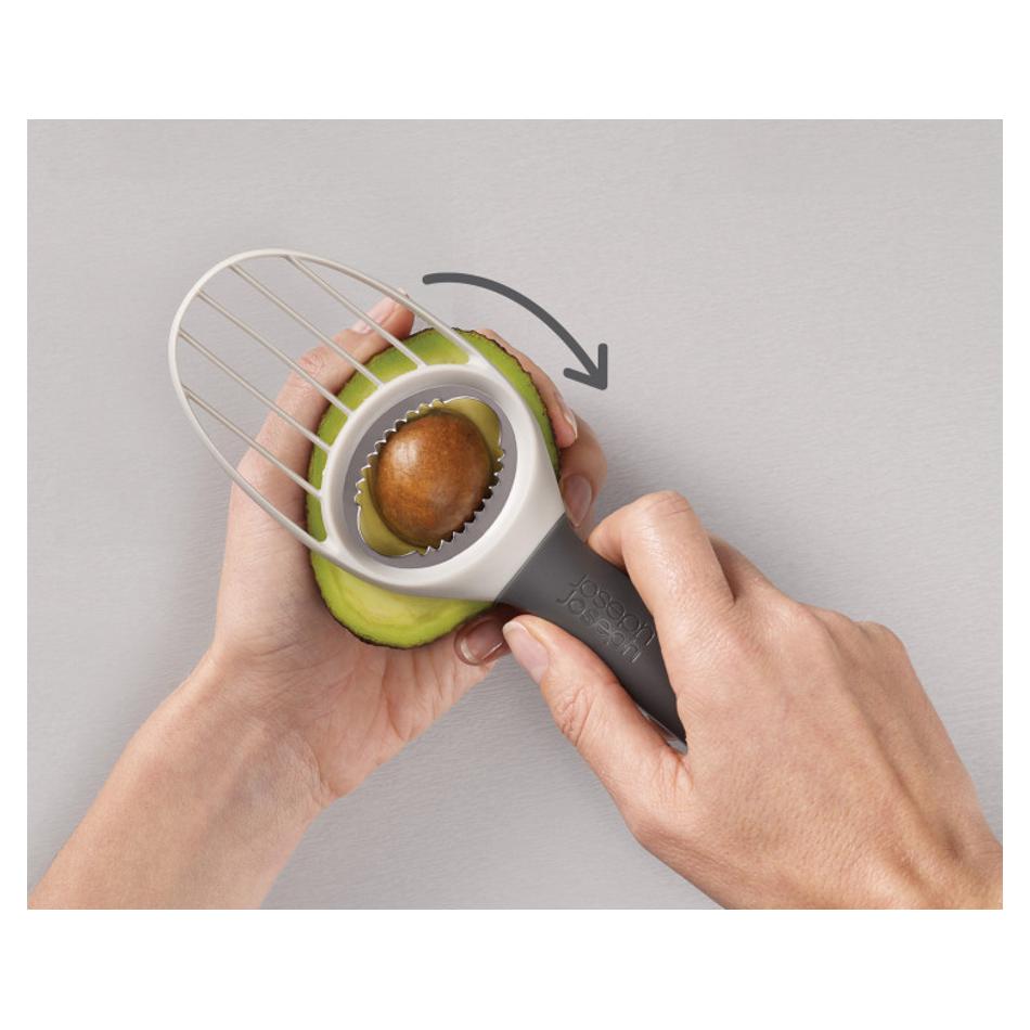 Joseph Joseph Duo Avocado Tool twisting to remove an avocado stone