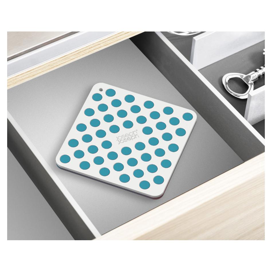 Joseph Joseph Duo Silicone Trivets nested neatly inside a kitchen drawer