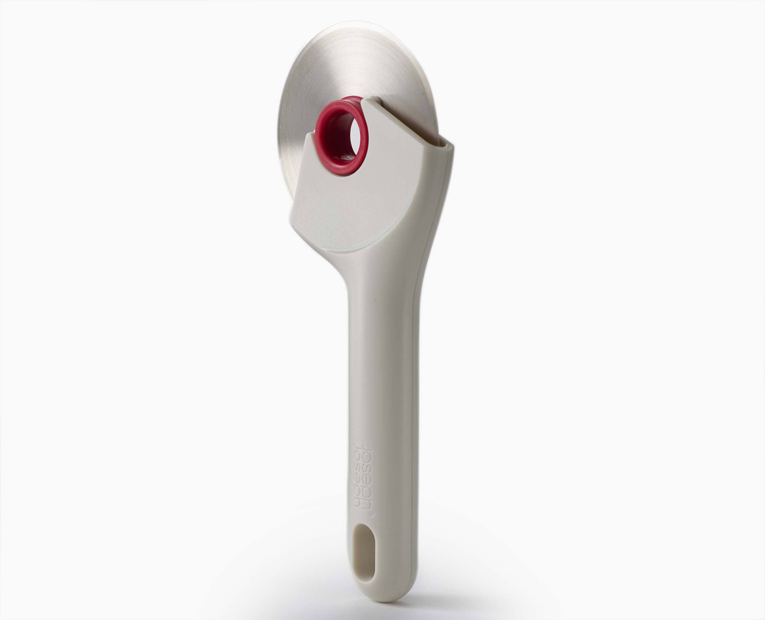 Joseph Joseph Ringo Easy-Clean Pizza Wheel Stone and Red 20232 — top view of removable wheel design