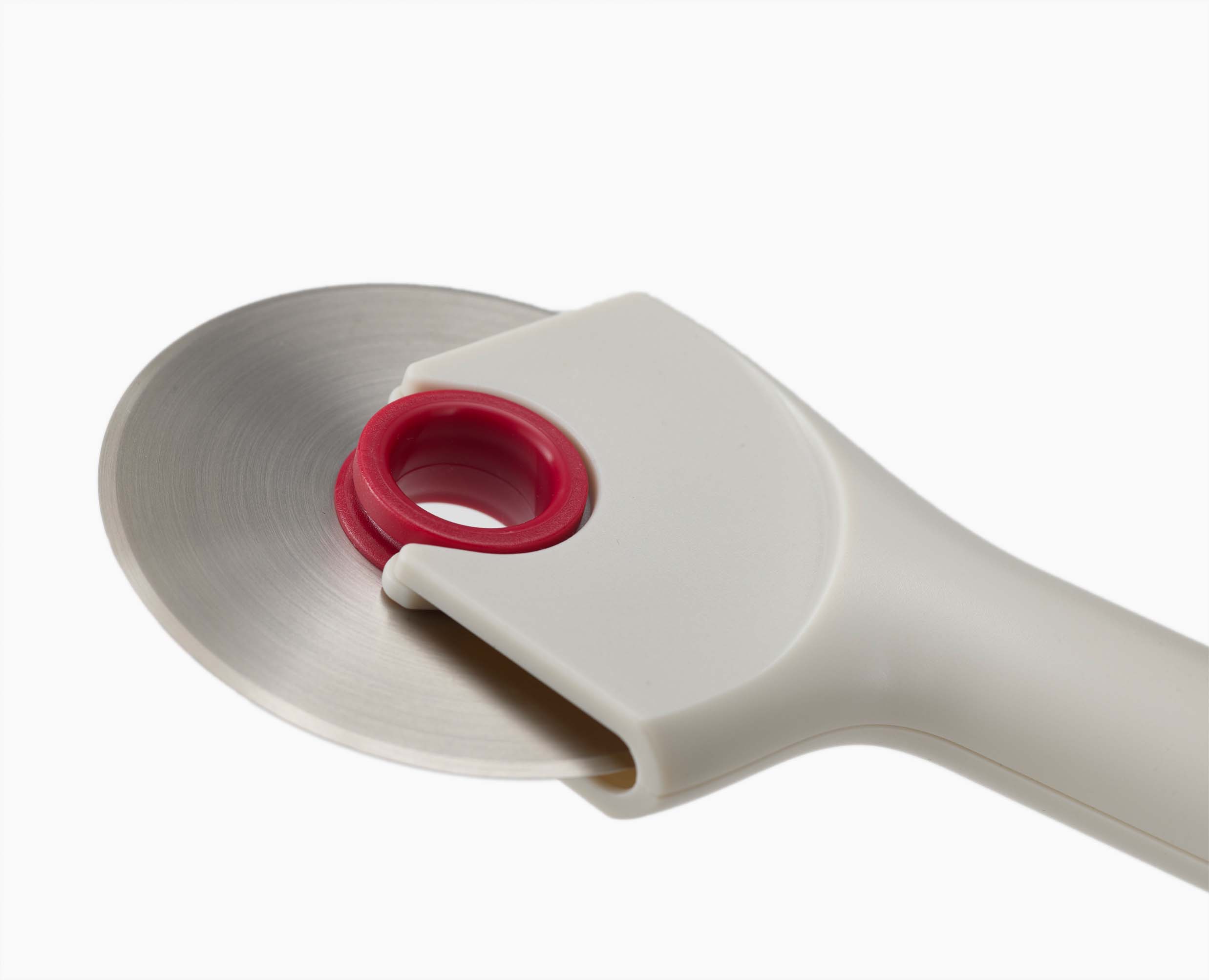 Joseph Joseph Ringo Easy-Clean Pizza Wheel Stone and Red 20232 — stainless-steel cutting blade detail