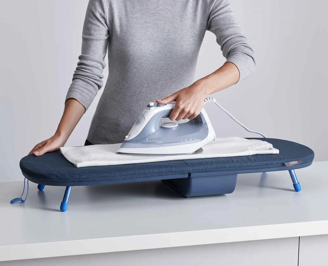 Joseph Joseph Pocket Plus Folding Tabletop Ironing Board Blue 50010 — DripLock cover and folding feature diagram