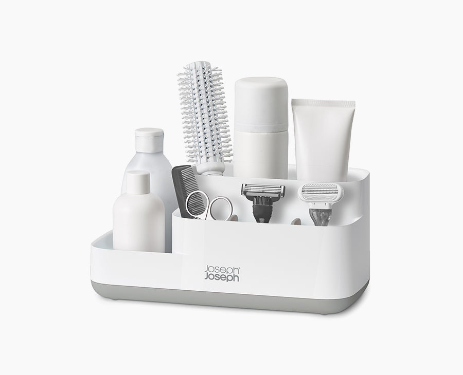 Joseph Joseph EasyStore Bathroom Caddy Grey and White 70513 — light-grey bathroom caddy holding toiletries