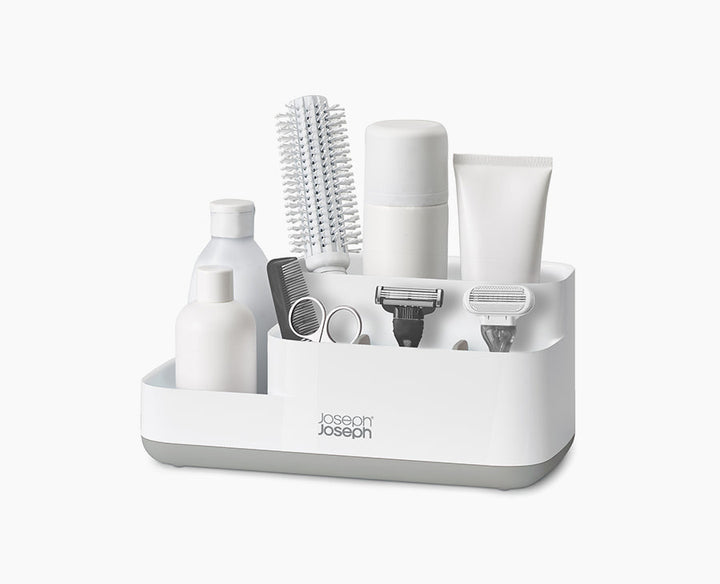 Joseph Joseph EasyStore Bathroom Caddy Grey and White 70513 — light-grey bathroom caddy holding toiletries