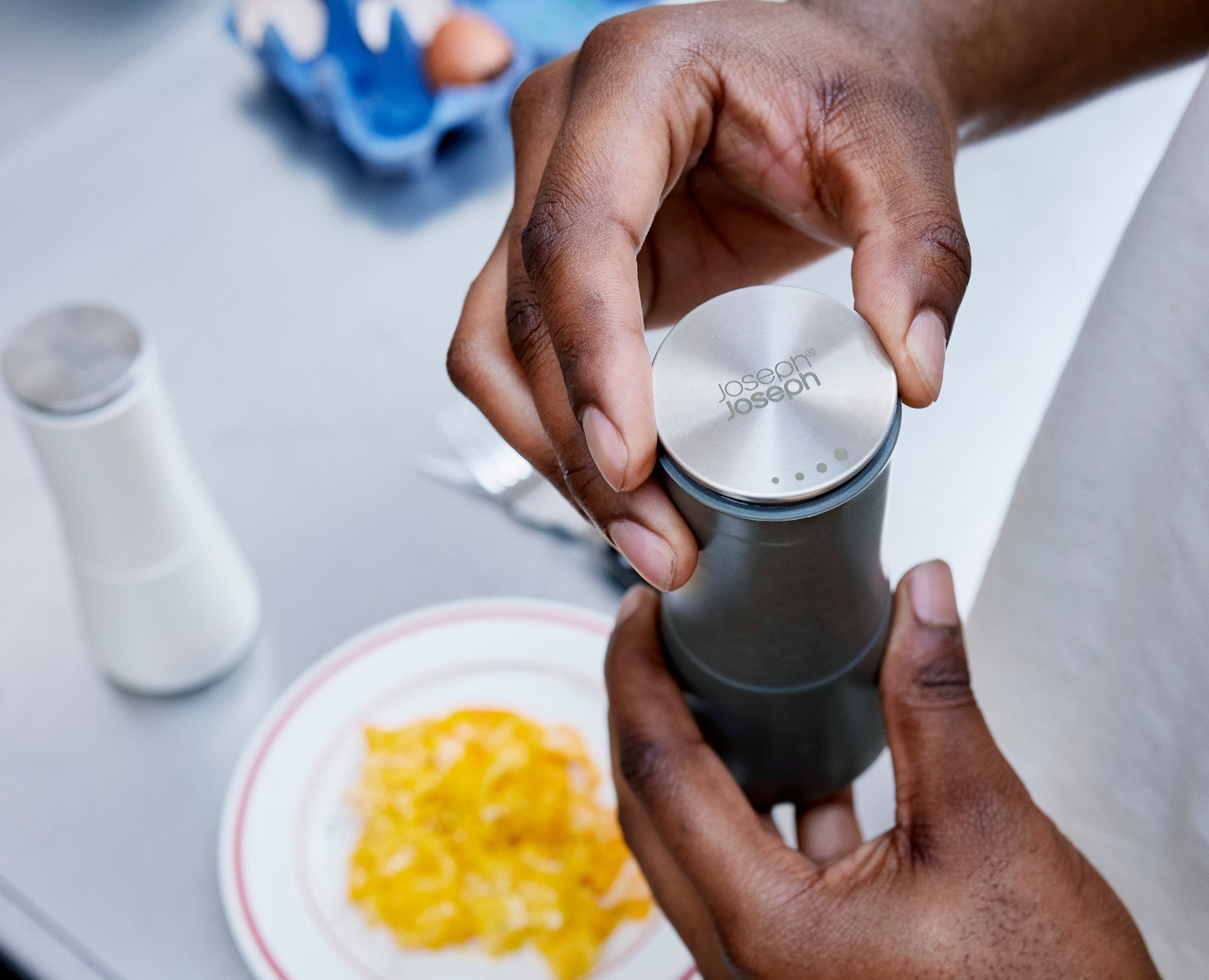 Joseph Joseph Milltop Non-Spill Salt and Pepper Mill Set Grey 95036 — refillable chamber being opened