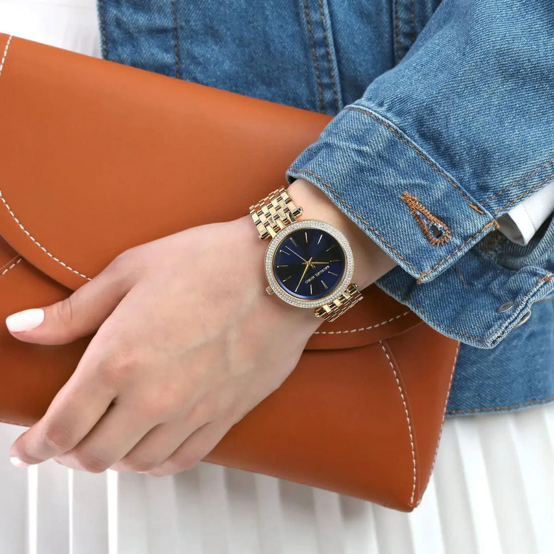 Michael Kors Darci MK3406 gold-tone blue dial watch worn on wrist