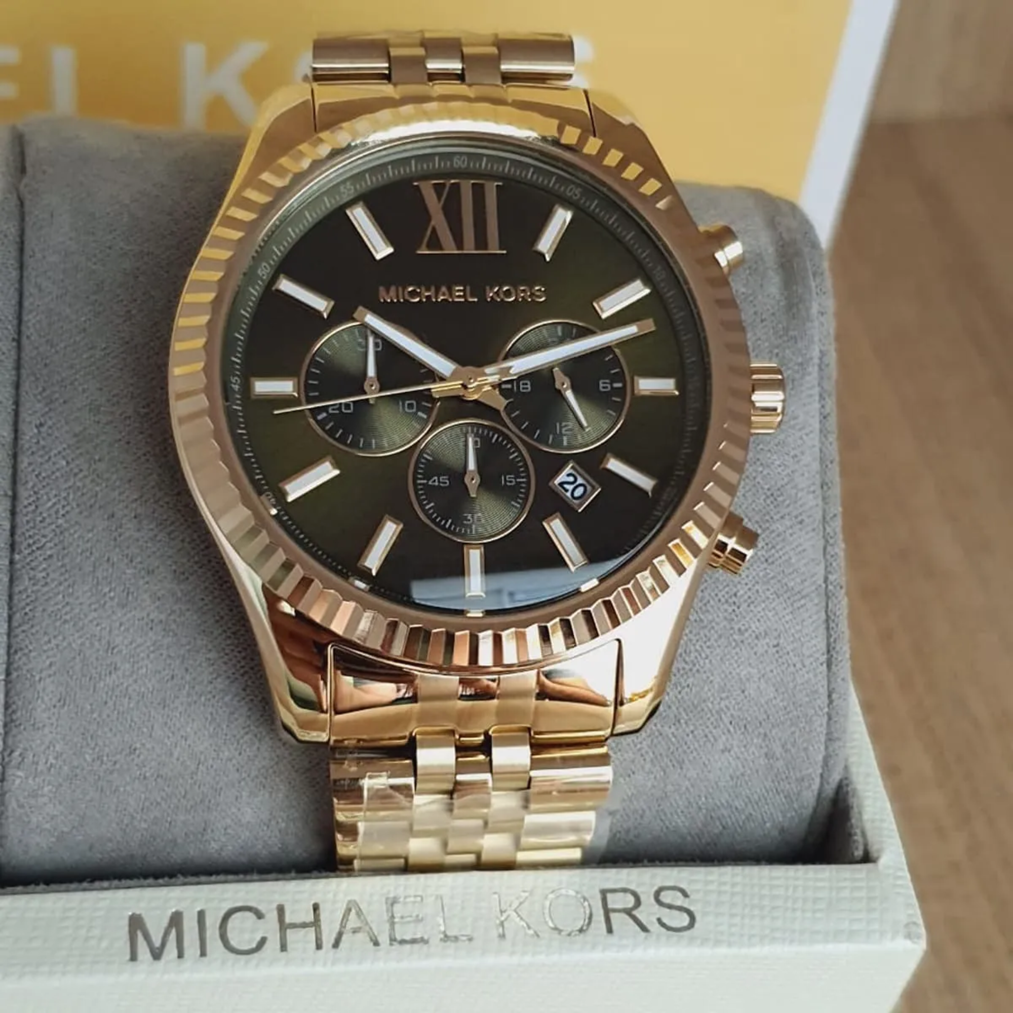 Michael Kors Lexington MK8446 gold-tone chronograph watch displayed in Michael Kors box