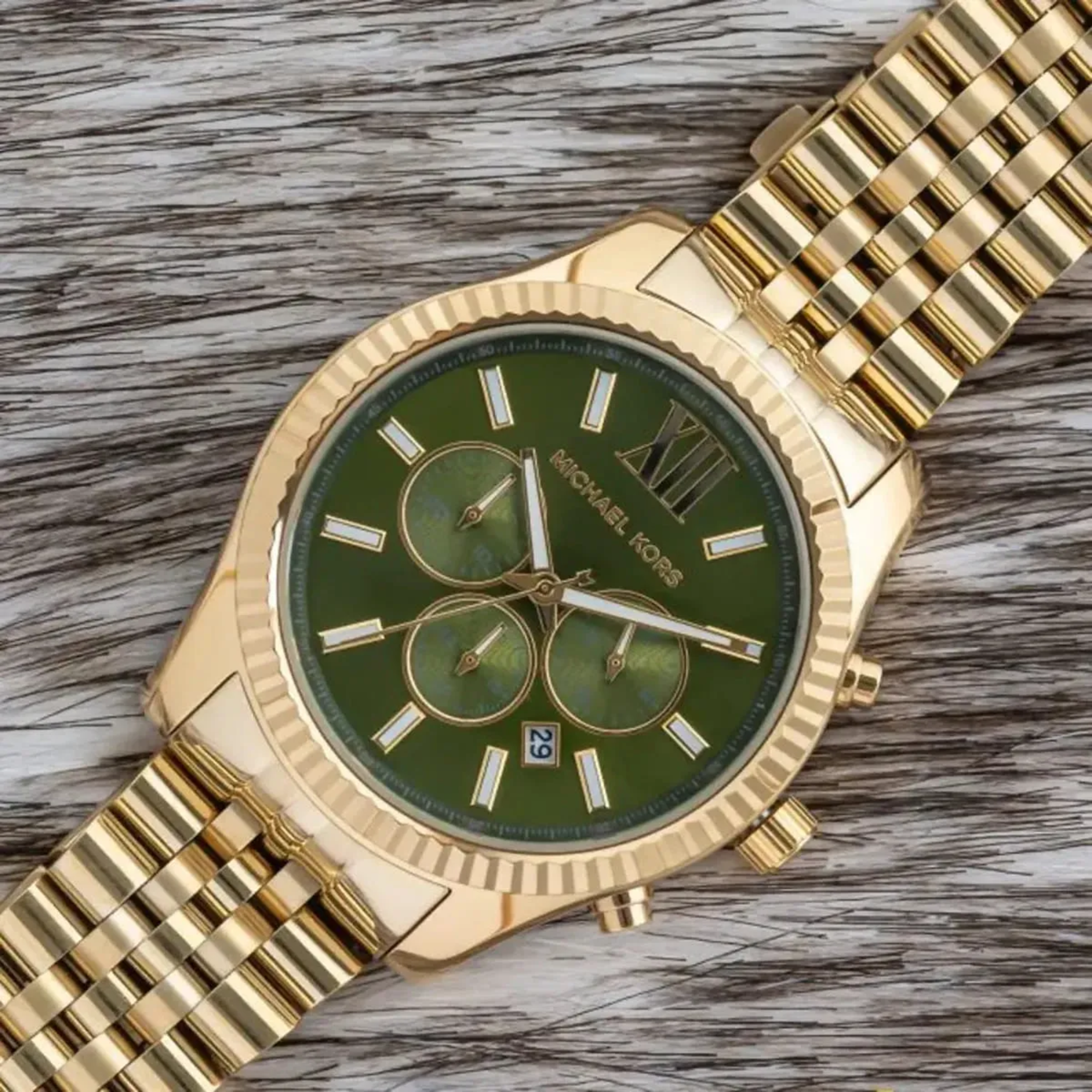 Michael Kors Lexington MK8446 green chronograph dial and gold-tone bracelet detail