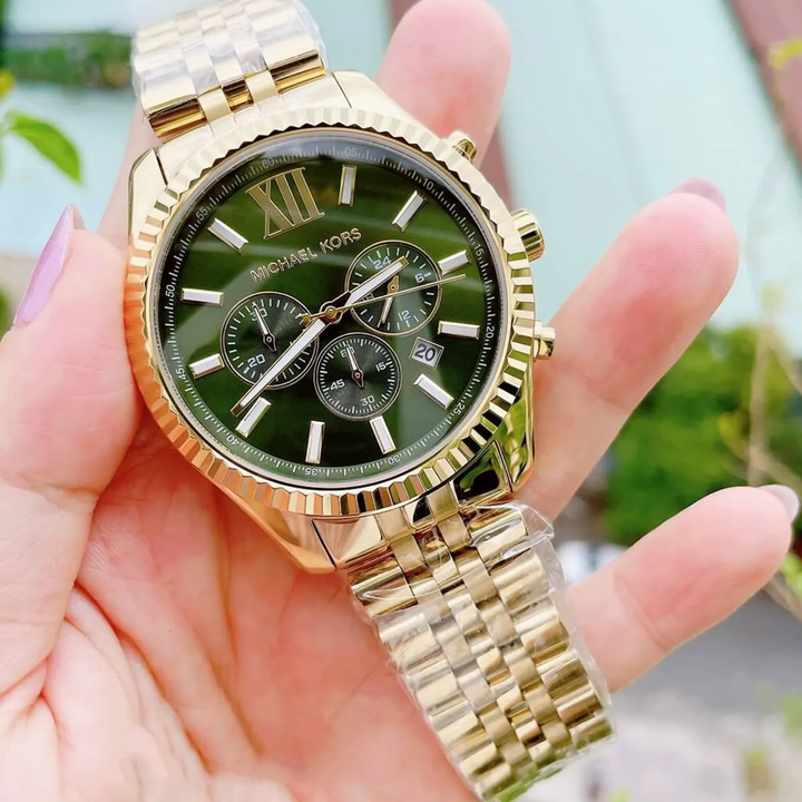 Michael Kors Lexington MK8446 gold-tone watch handheld angled front view