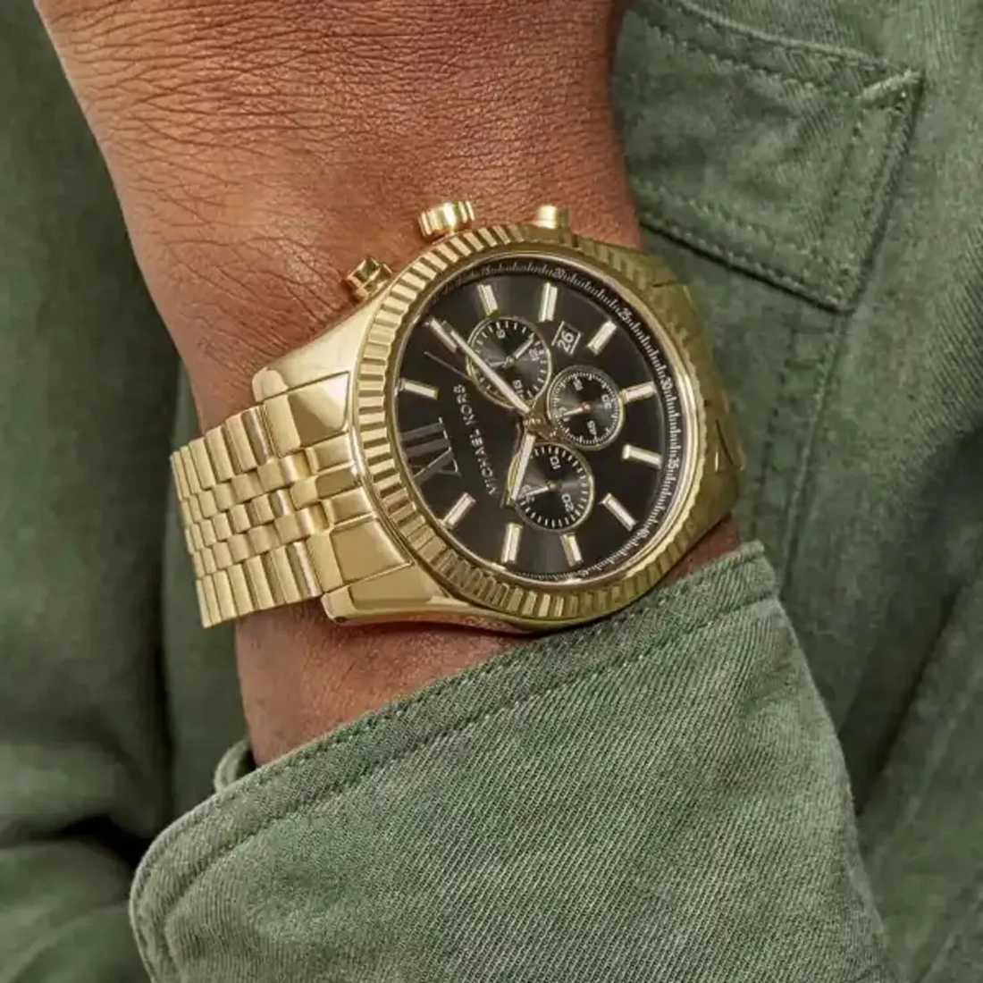Michael Kors Lexington MK8446 gold-tone green dial chronograph watch worn on wrist
