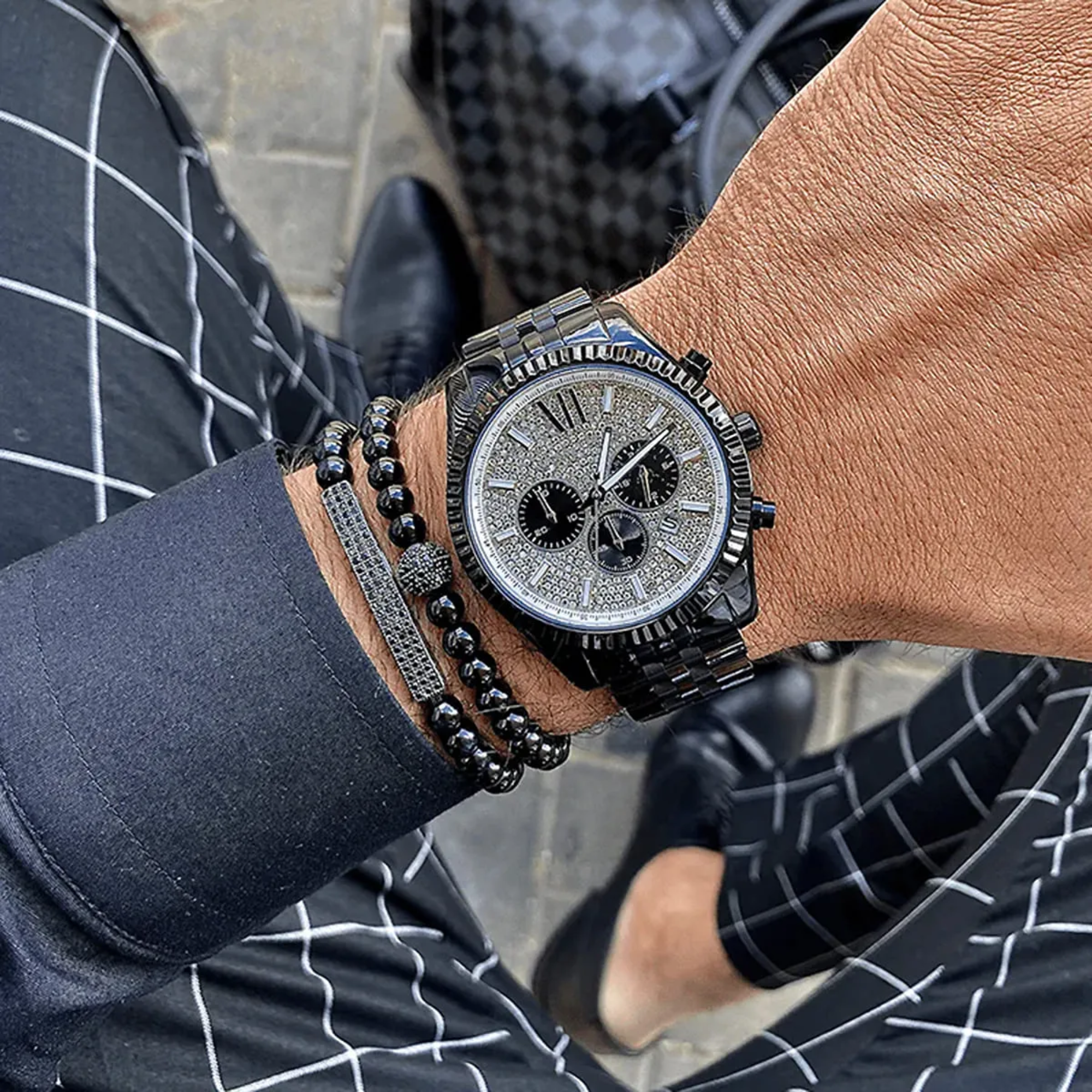 Michael Kors Lexington MK8605 pavé-style chronograph wrist view with blue shirt