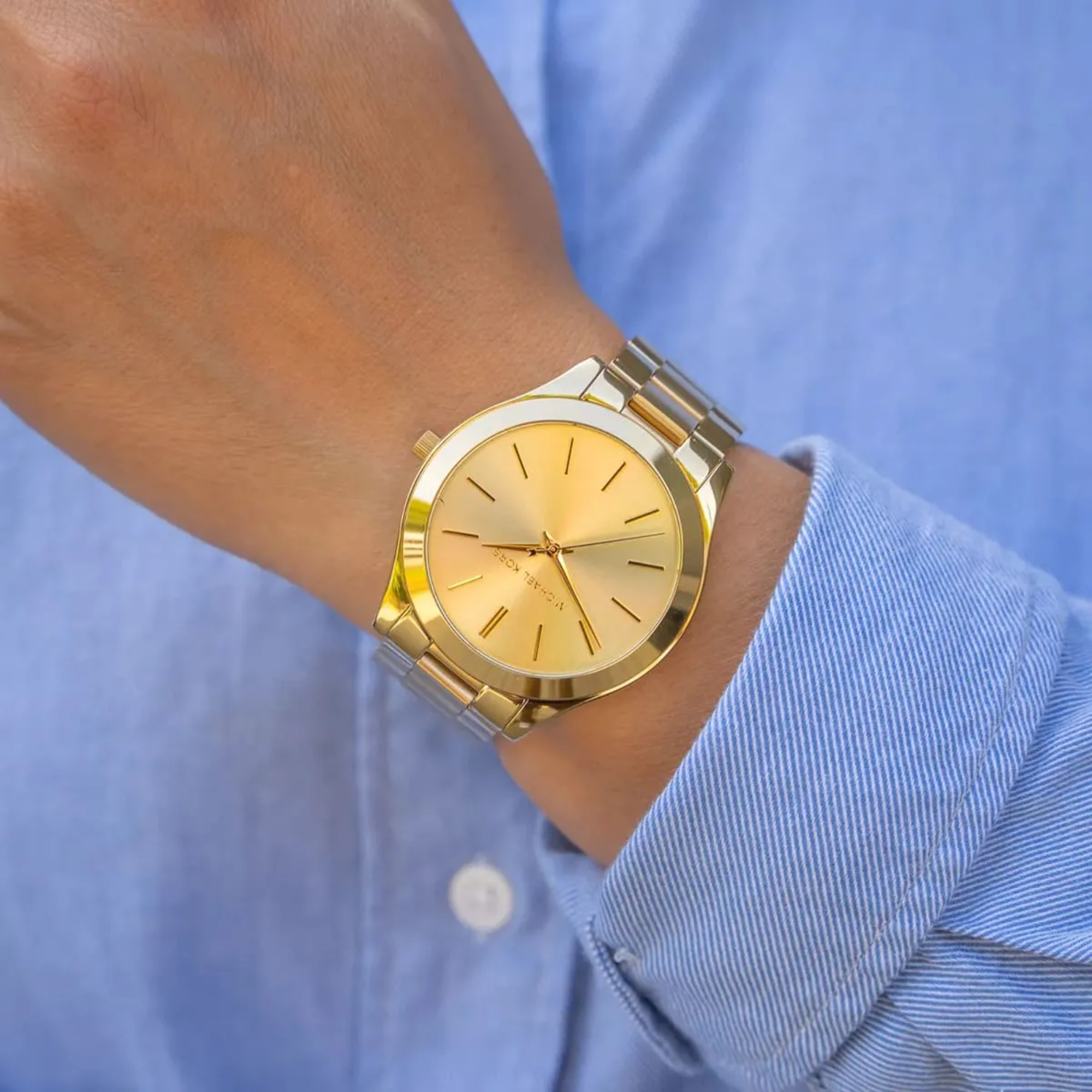 Michael Kors MK3179 gold-tone watch styled with blue shirt