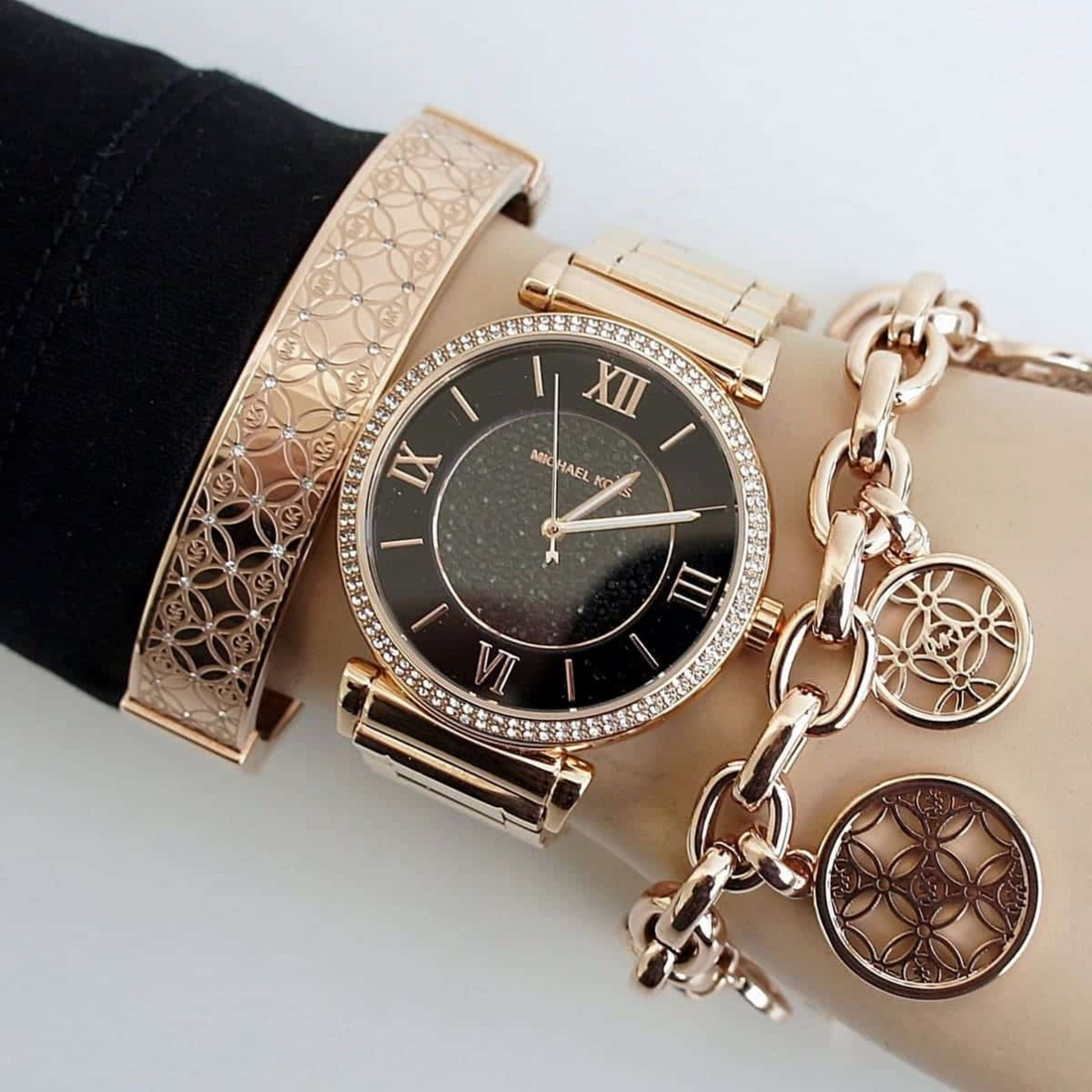 Michael Kors MK3356 rose gold-tone pavé watch styled with jewellery