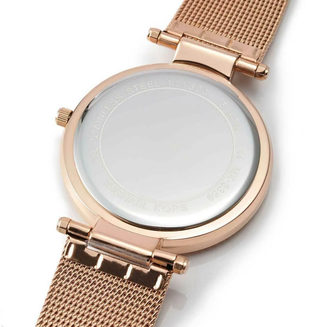 Michael Kors MK3369 caseback engraving and rose gold-tone mesh strap detail