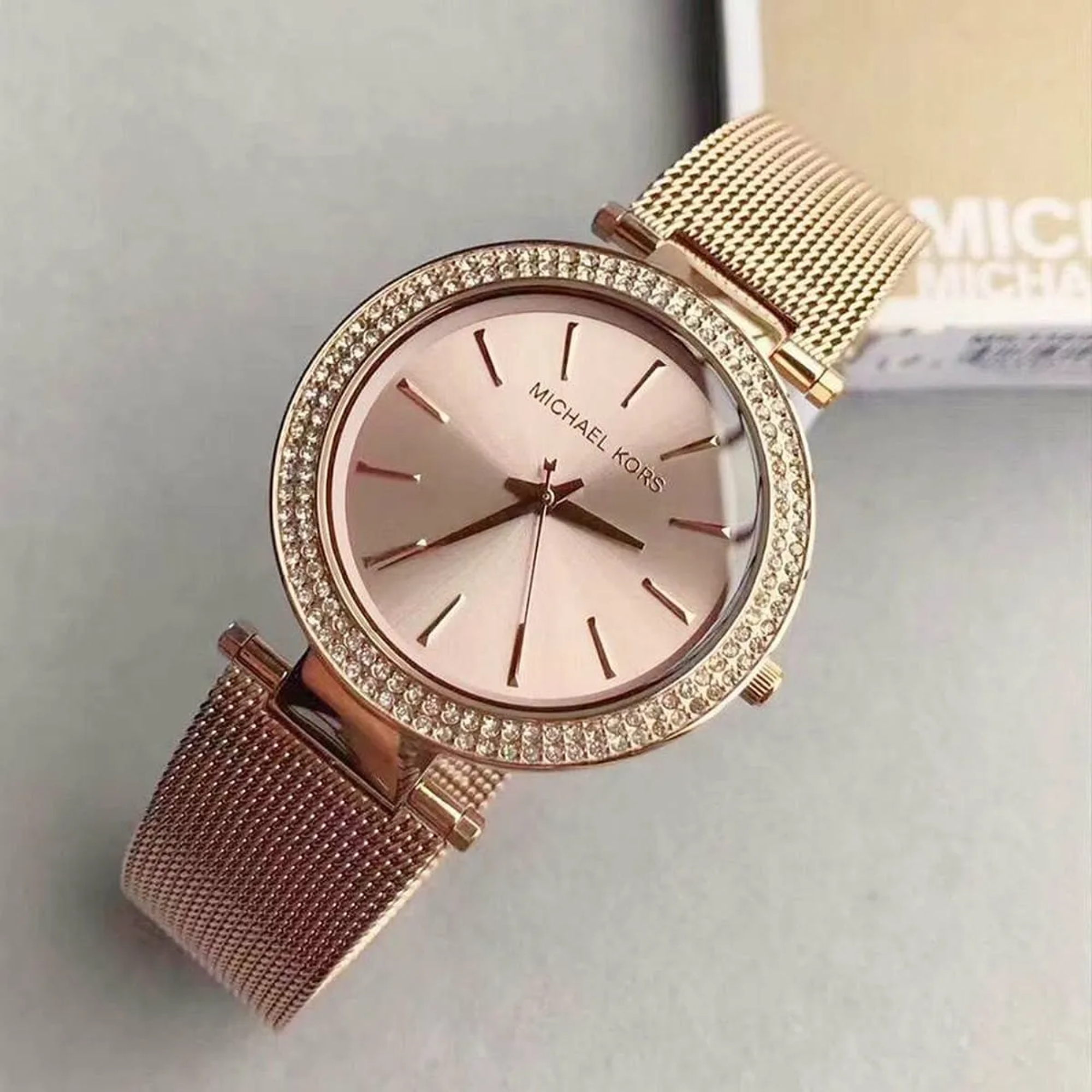 Michael Kors Darci MK3369 women's rose gold-tone pavé watch lifestyle close-up