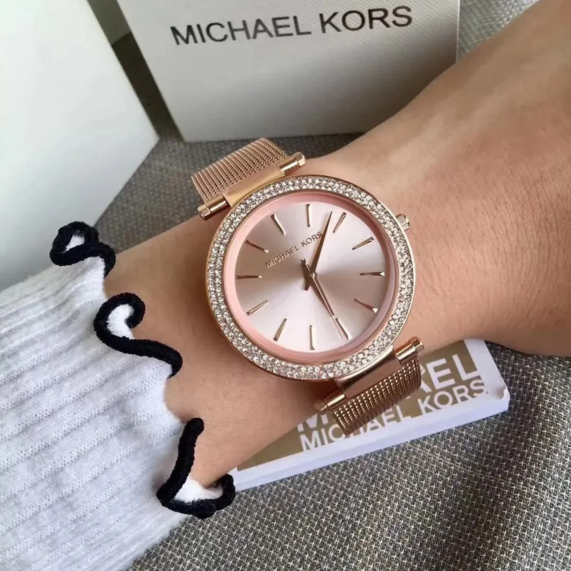 Michael Kors Darci MK3369 women's rose gold-tone watch worn on wrist