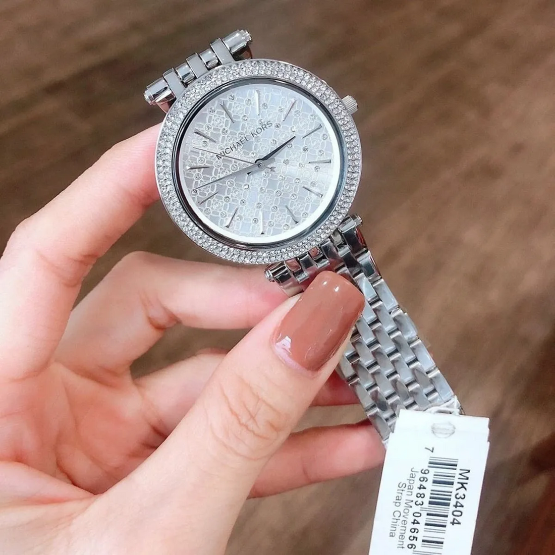 Michael Kors Darci MK3404 silver watch handheld lifestyle view