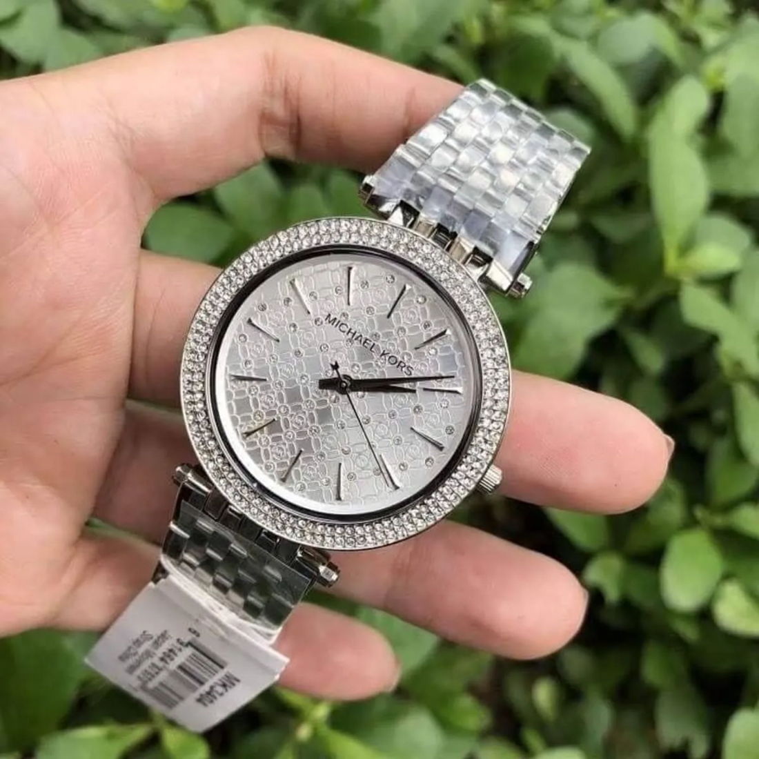 Michael Kors Darci MK3404 silver watch handheld outdoor view