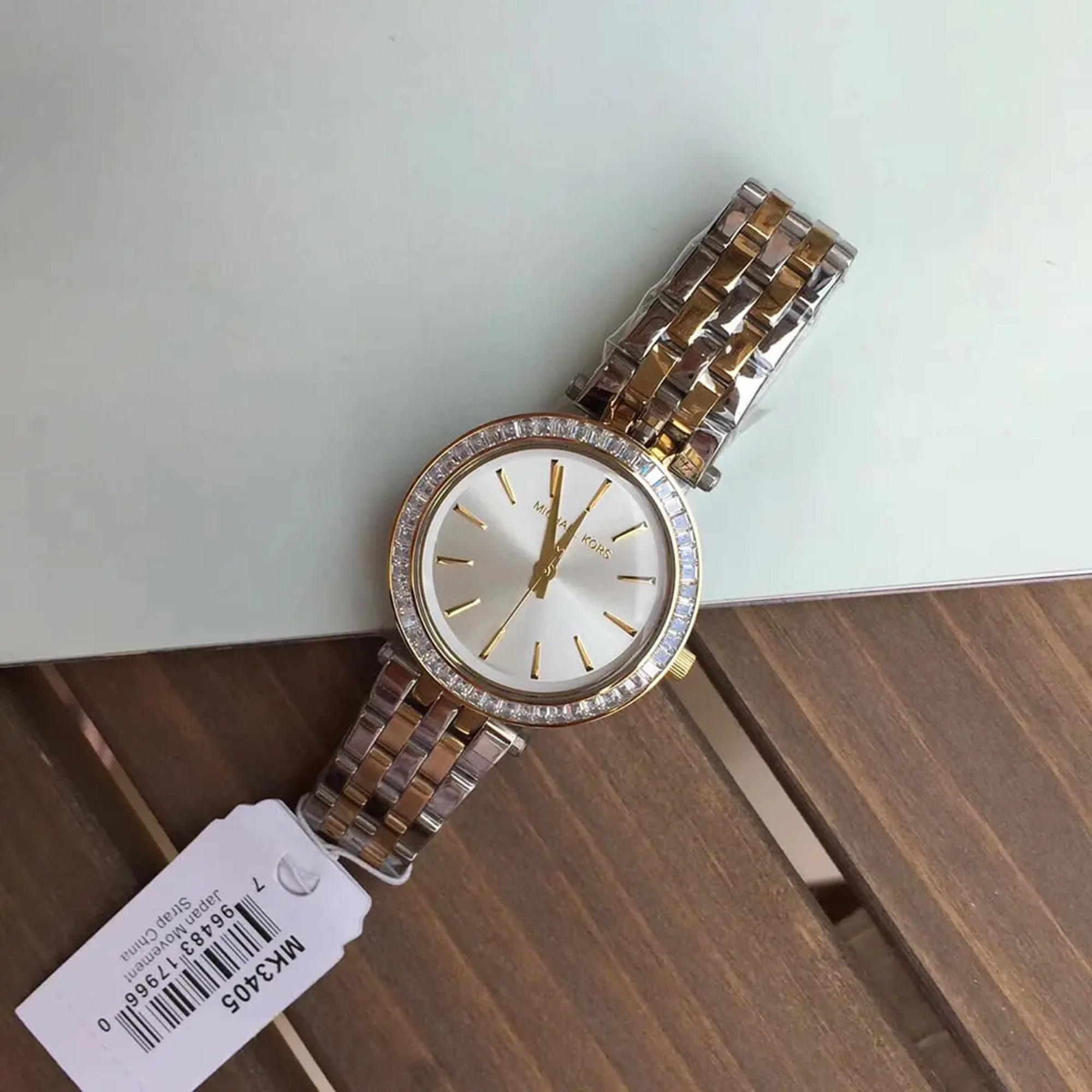 Michael Kors Mini Darci MK3405 two-tone crystal bezel watch actual product hand-held view
