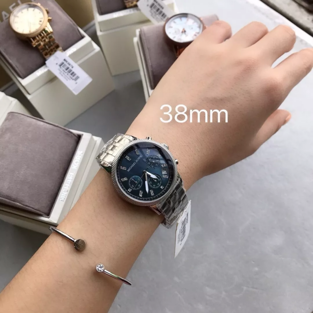 Michael Kors MK5021 silver watch dark chronograph dial wrist view