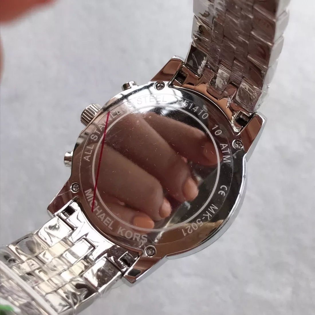 Michael Kors MK5021 stainless steel caseback close-up