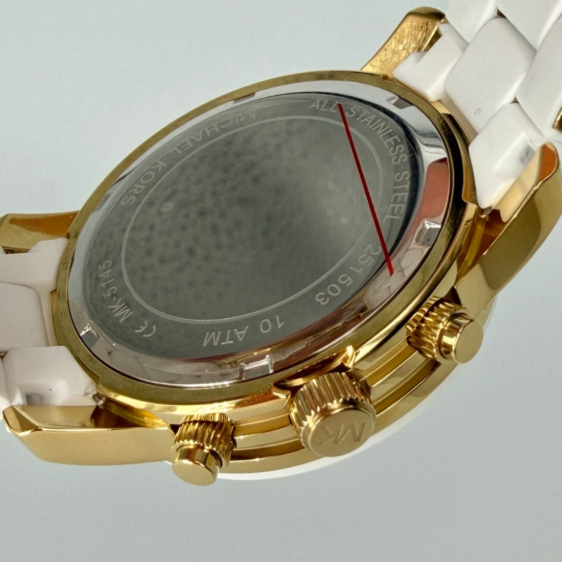 Michael Kors Runway MK5145 caseback showing model reference and 10 ATM engraving