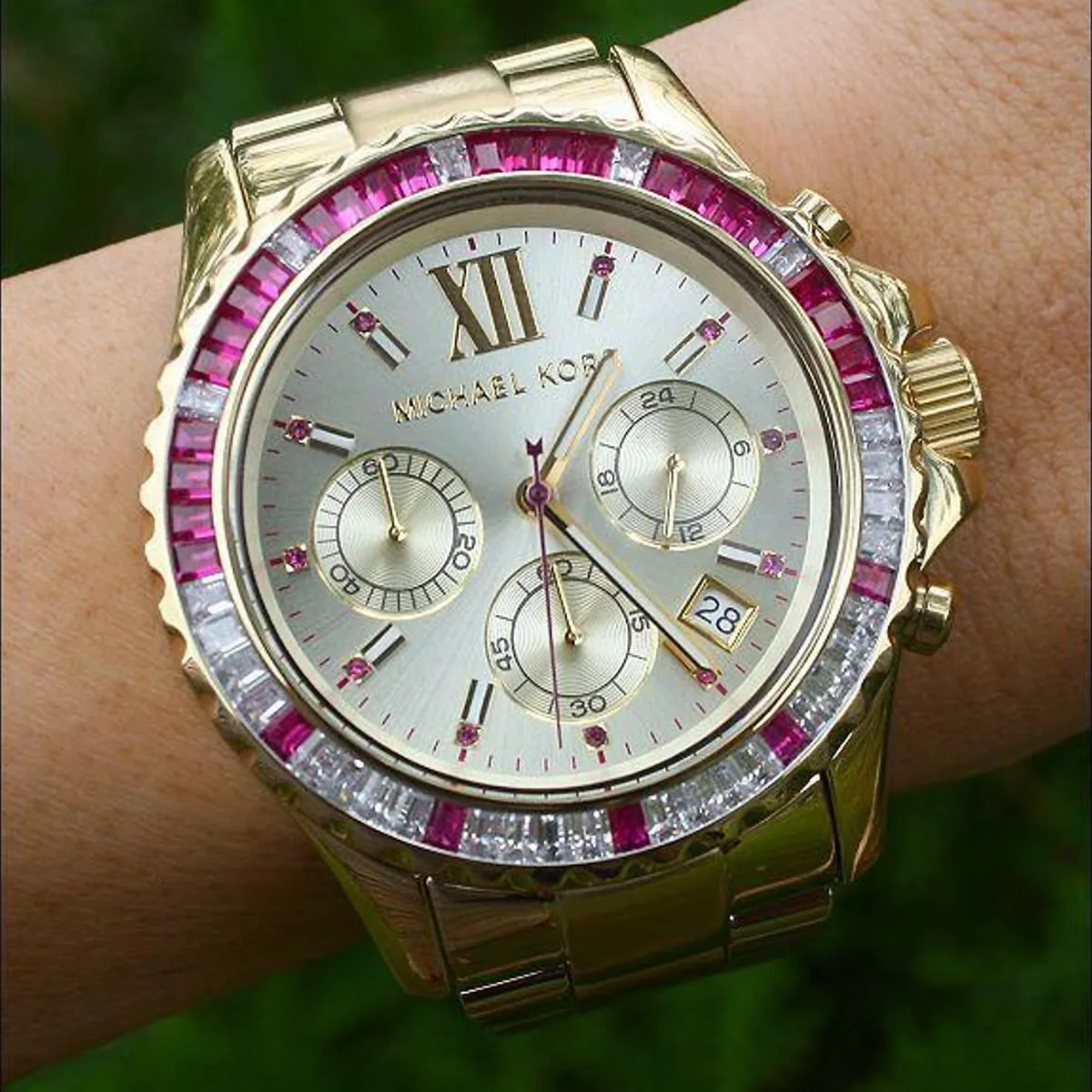 Michael Kors MK5871 dial close-up with chronograph subdials, date window and crystal-set bezel