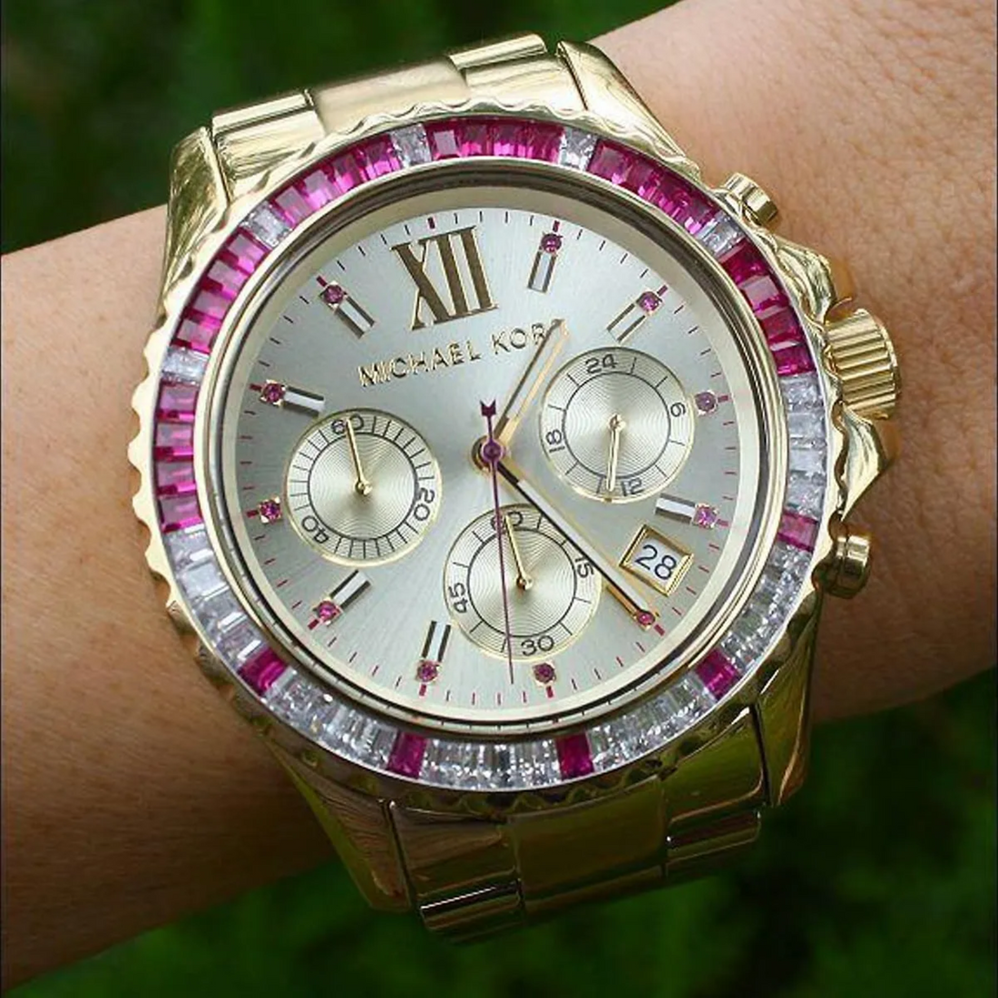 Michael Kors MK5871 dial close-up with chronograph subdials, date window and crystal-set bezel
