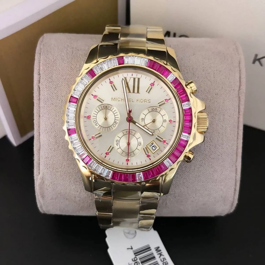 Michael Kors MK5871 angled dial view with pink and clear crystal bezel