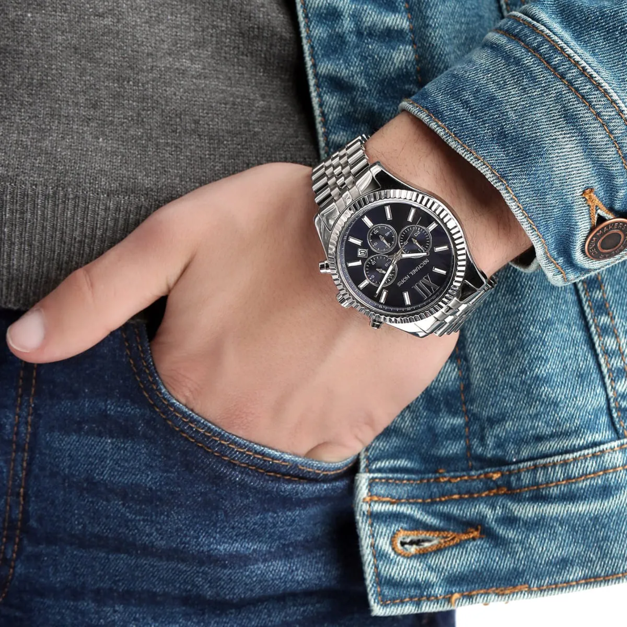 Michael Kors MK8280 silver-tone chronograph watch worn on wrist