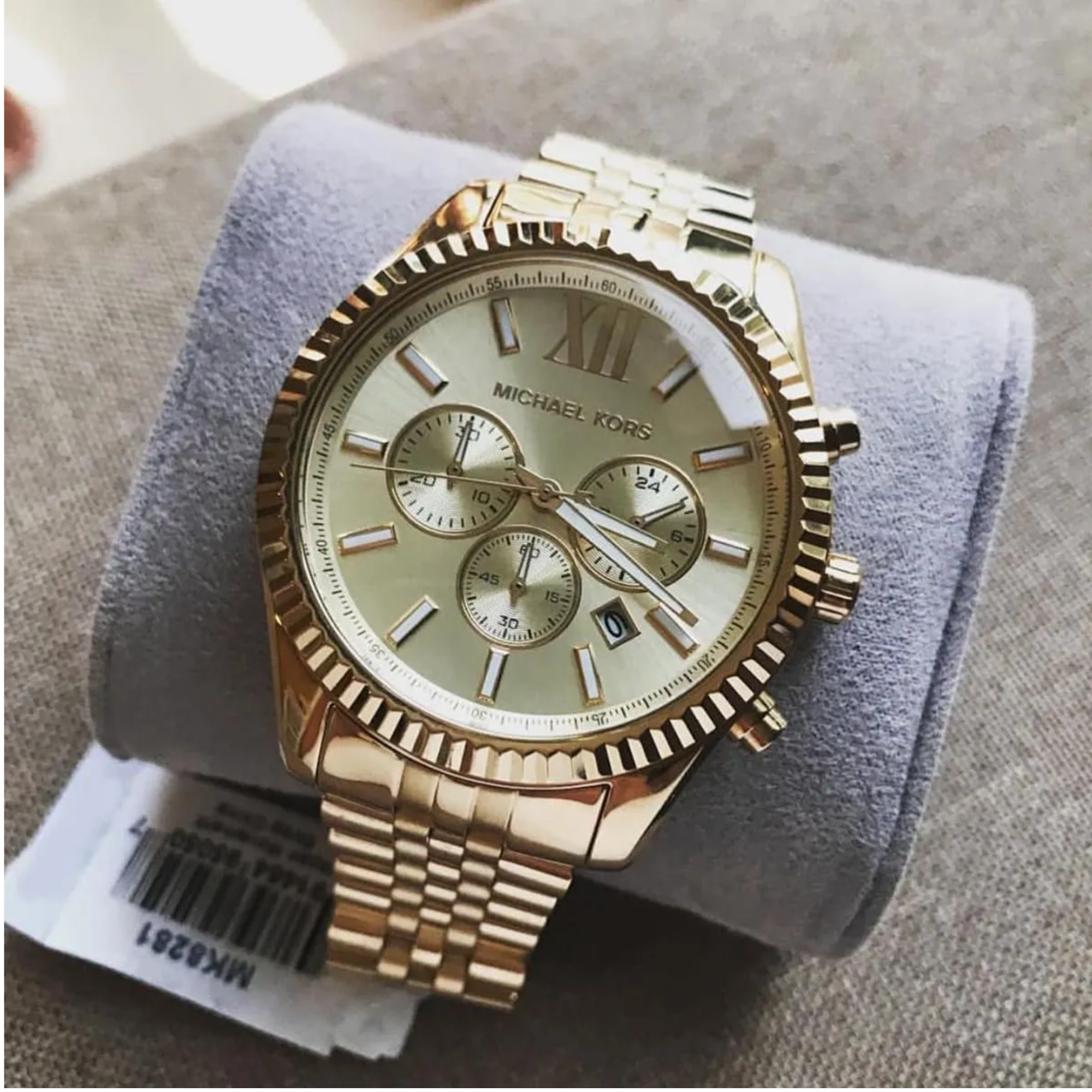 Michael Kors Lexington MK8281 gold-tone watch product lifestyle close-up