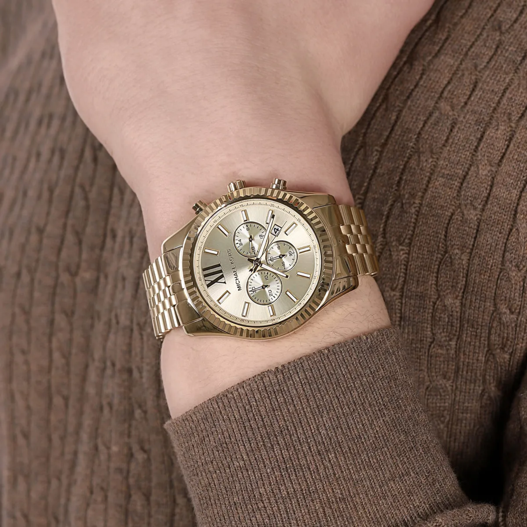 Michael Kors Lexington MK8281 gold-tone chronograph worn on wrist