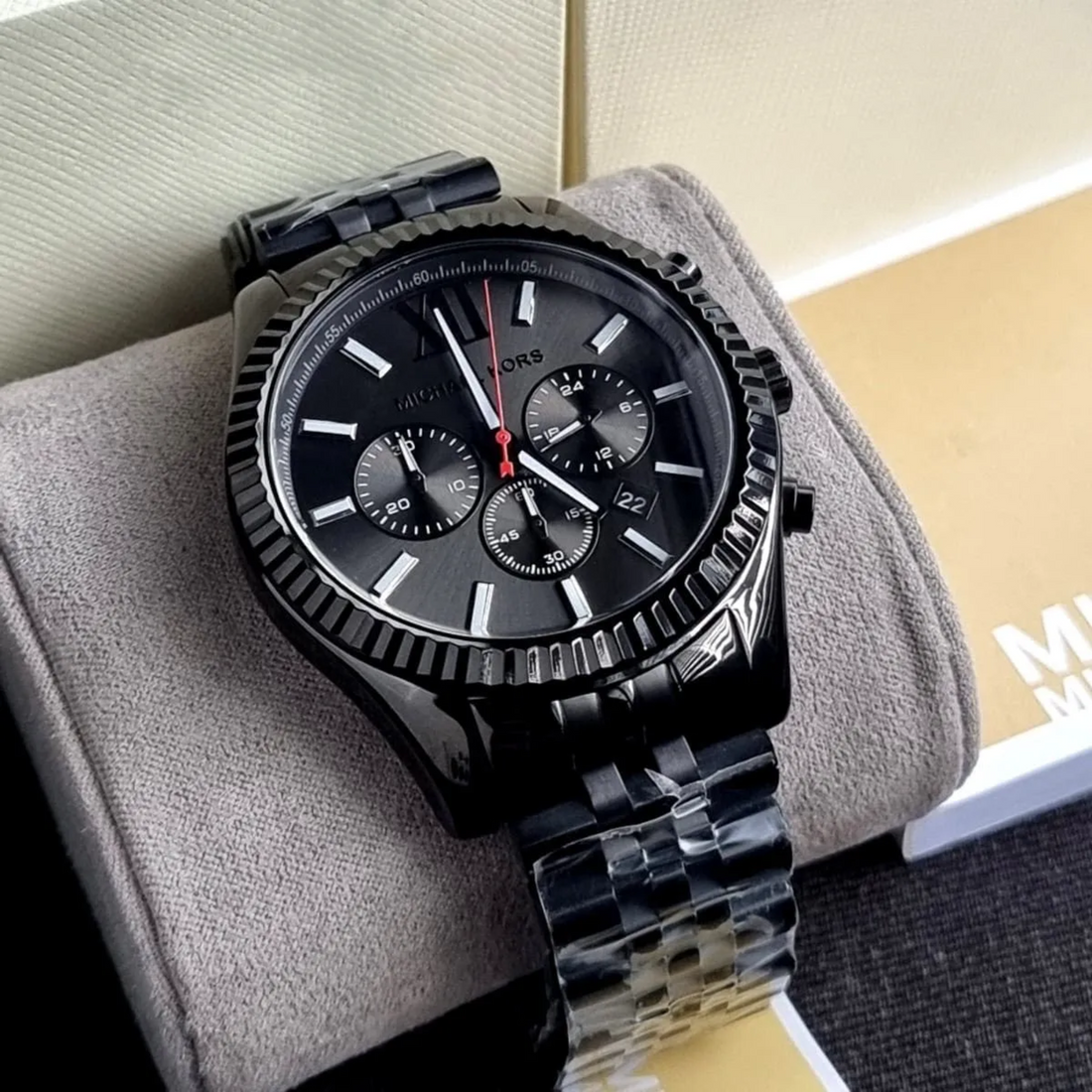 Michael Kors MK8320 black chronograph dial and fluted bezel close-up