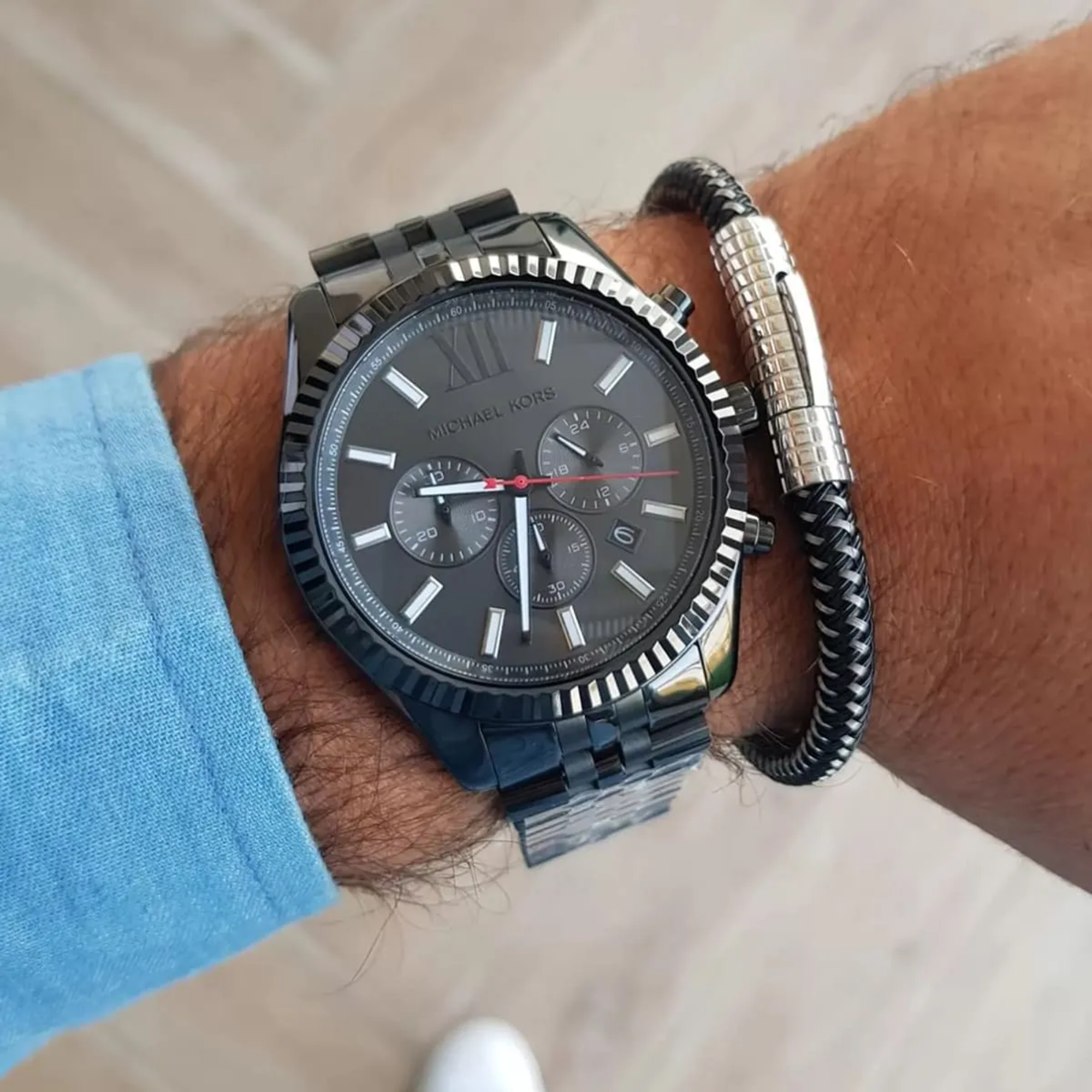 Michael Kors MK8320 black chronograph watch with model tag and bracelet detail