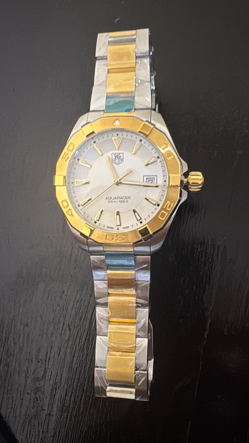 Actual TAG Heuer Aquaracer two-tone wristwatch supplied for identification, front view